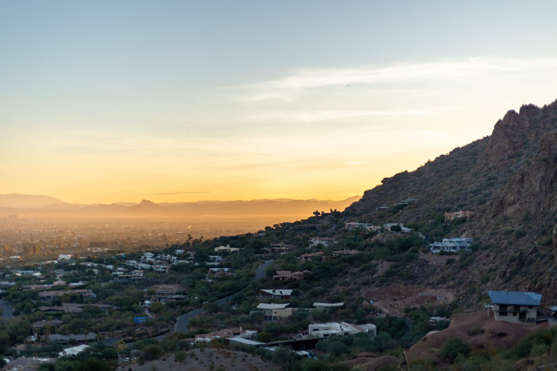 Sunset over Phoenix seen from the slope of Camelback Mountain